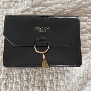 Jimmy Choo Black Clutch with Gold Tassel